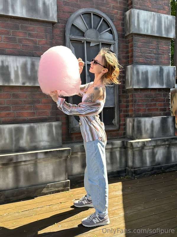 Happiness is just a giant cotton candy and the wind playing ..