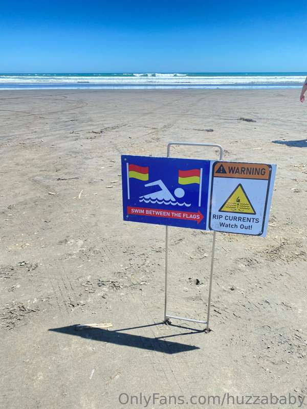 Burnt my feet on the hot hot sand. The sand stuck to my wet ..