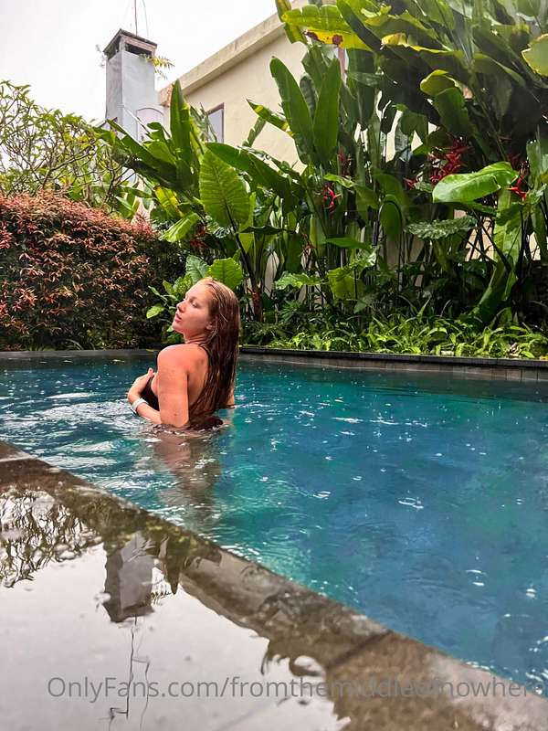 The water in the pool is so warm and the rain is cold, but I..