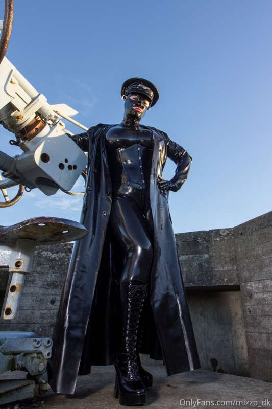 In full rubber and rubber trenchcoat out visiting an old WW2..