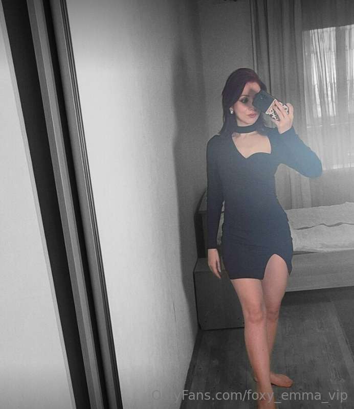 In the timeless elegance of a black dress, I embody the epit..