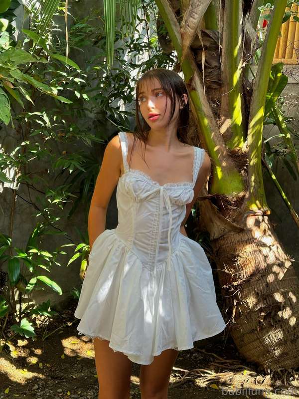 What do you think of my dress? I look like I ran away from a..