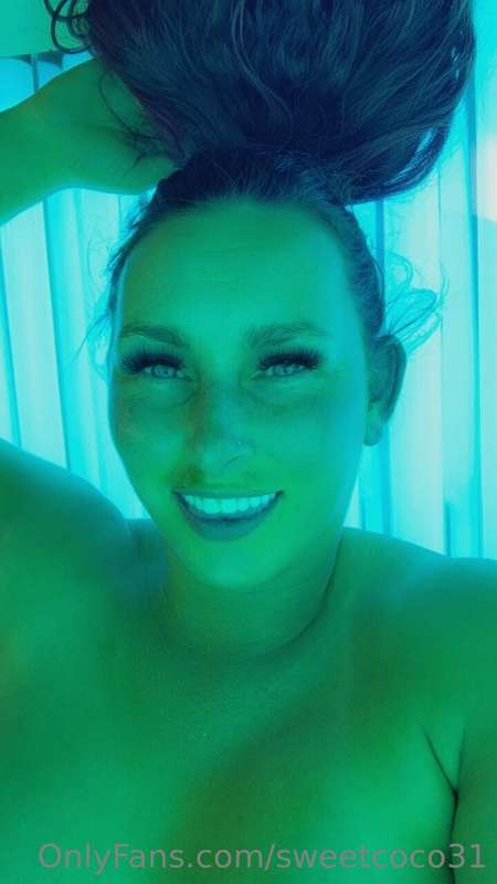 I love relaxing in my tanning bed