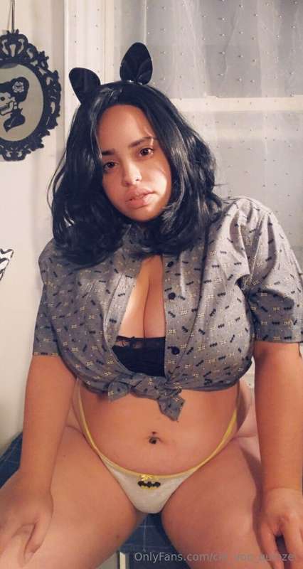 Just a cat waiting for her bat,  won't you be my dark knight..