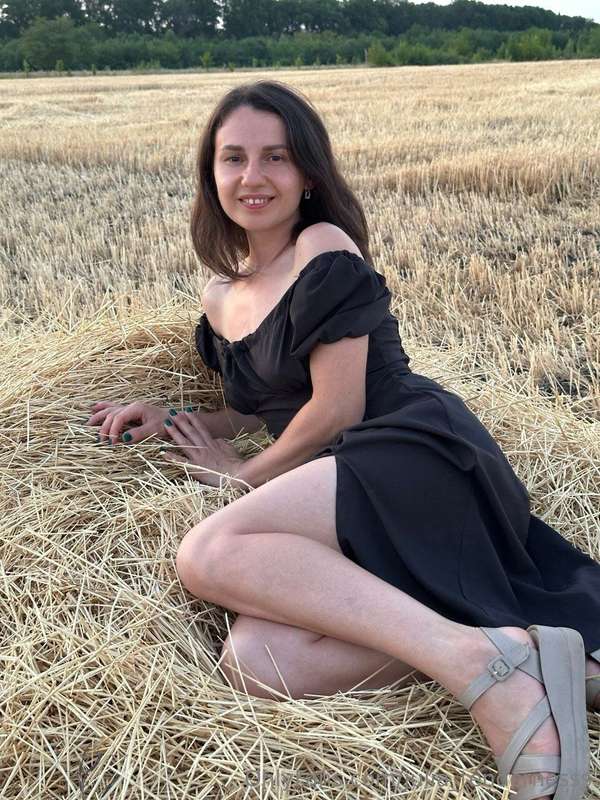 The hay rustles beneath me, the dress caresses my body... an..