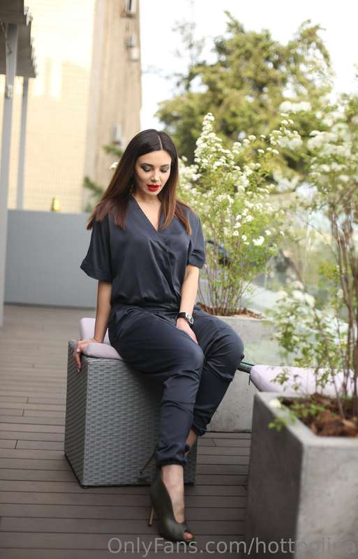 A woman is a flower that blooms in all its glory only in the..