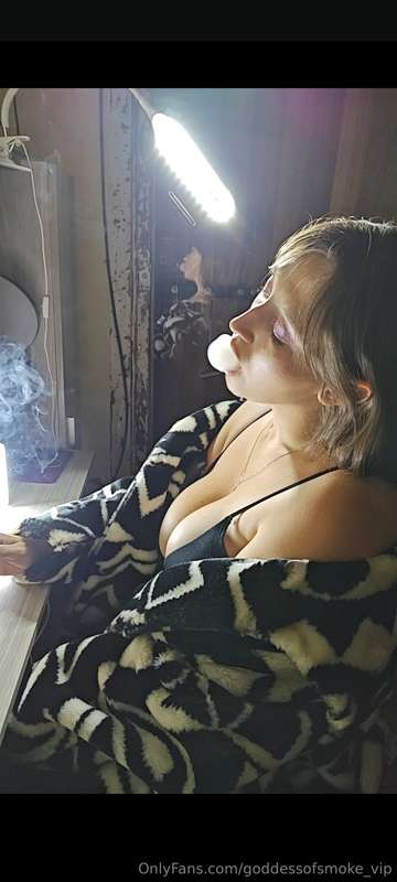 Wrapped in Fur, Surrounded by Smoke… 💨🔥Draped in my soft, fu..