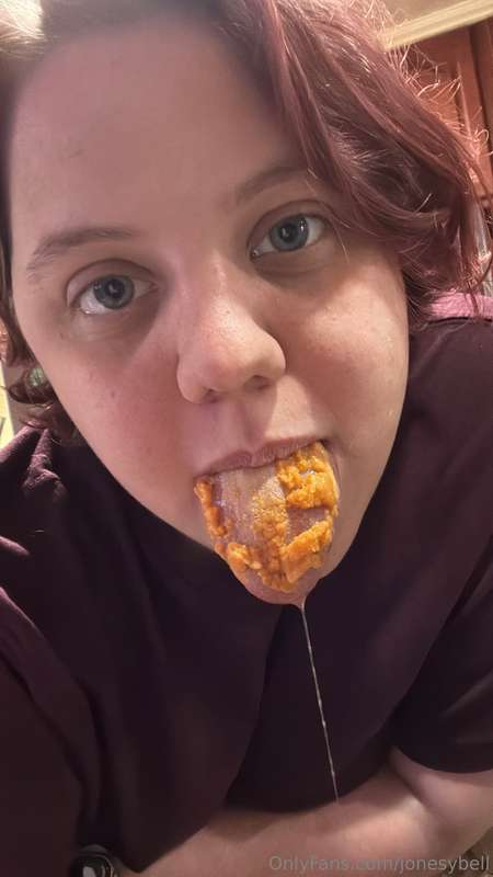 Showing off chewed up Cheez Its on my tongue and drooling 