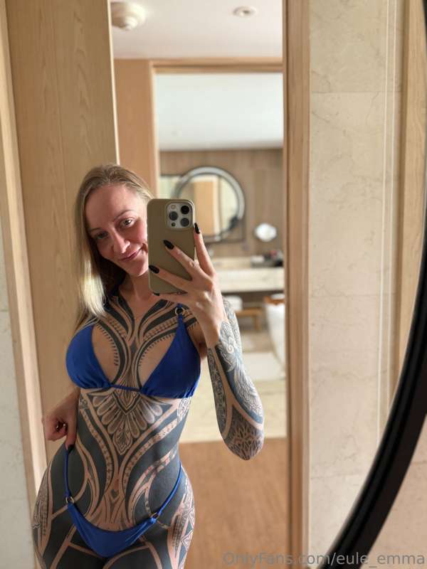 I’m showing off my curves in this blue bikini, but I’d rathe..