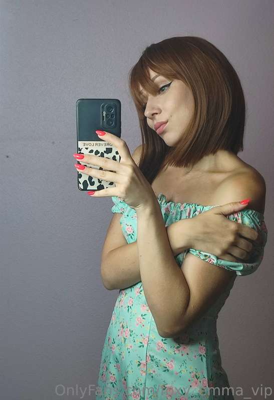 Dancing through life in this enchanting turquoise dress, fee..
