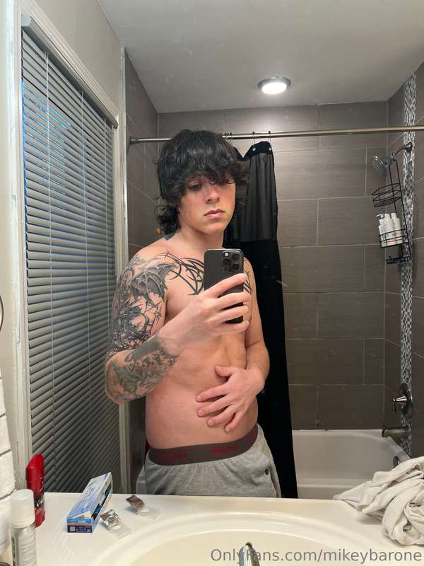 You think I look better like this, or with less on?
