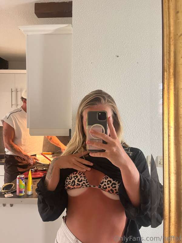 Checking out my tanlines while he is prepping dinner 😘