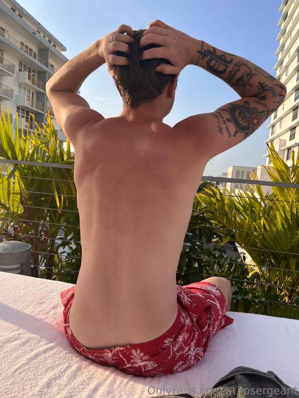 Working on my tan at the pool in Miami 😎