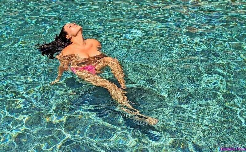 Topless in water