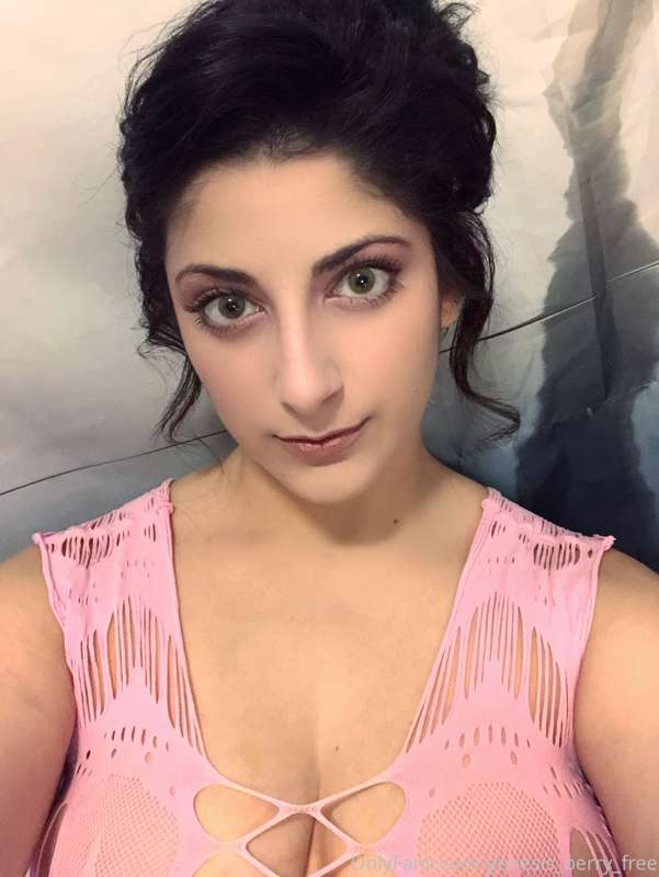 Sexy photos showing more of this pink fishnet dress are up o..