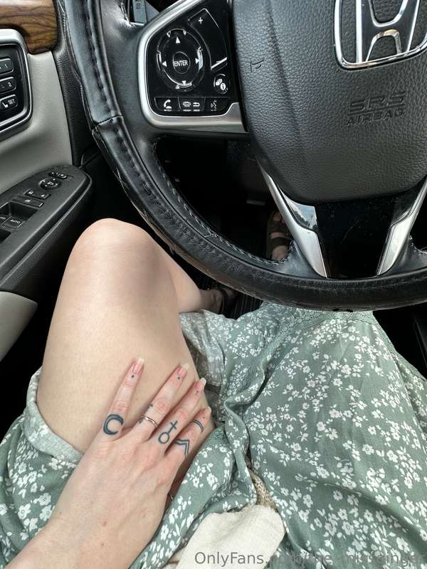 Car driving, easy access. Look at those toes peeking.