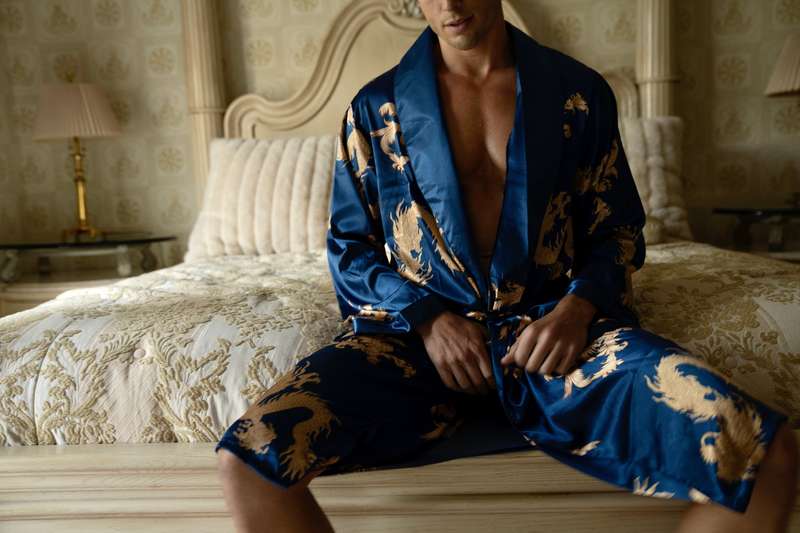 Wrapped in silk, on the bed, waiting for the right hands to ..