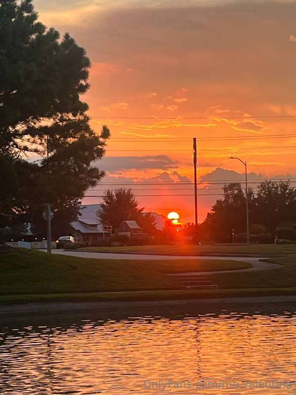 Fire in the sky, mirrored in the water. Absolutely stunning!..
